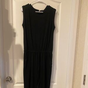 Jumpsuit Black Sleeveless 
15 waist and will stretch and 26 inseam